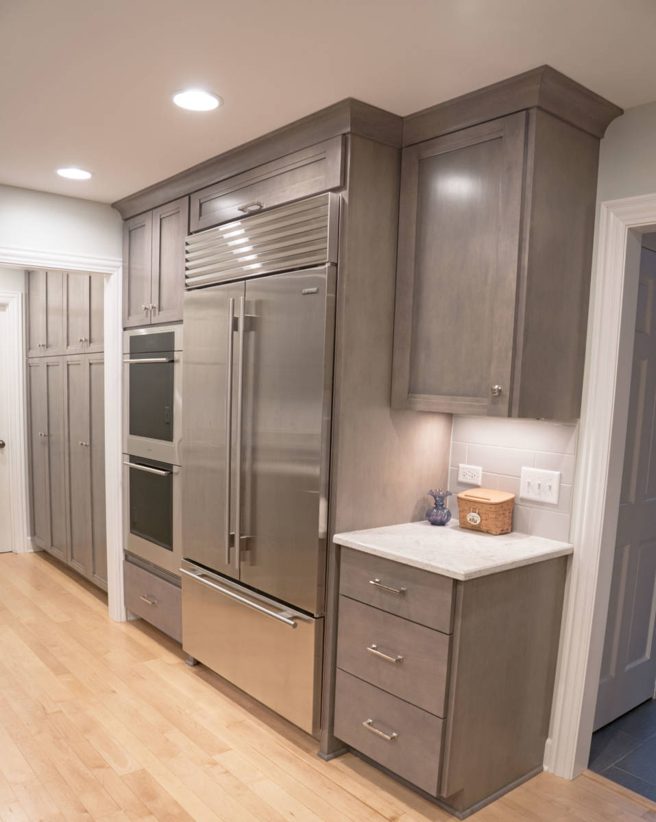 custom fitted cabinets around refrigerator